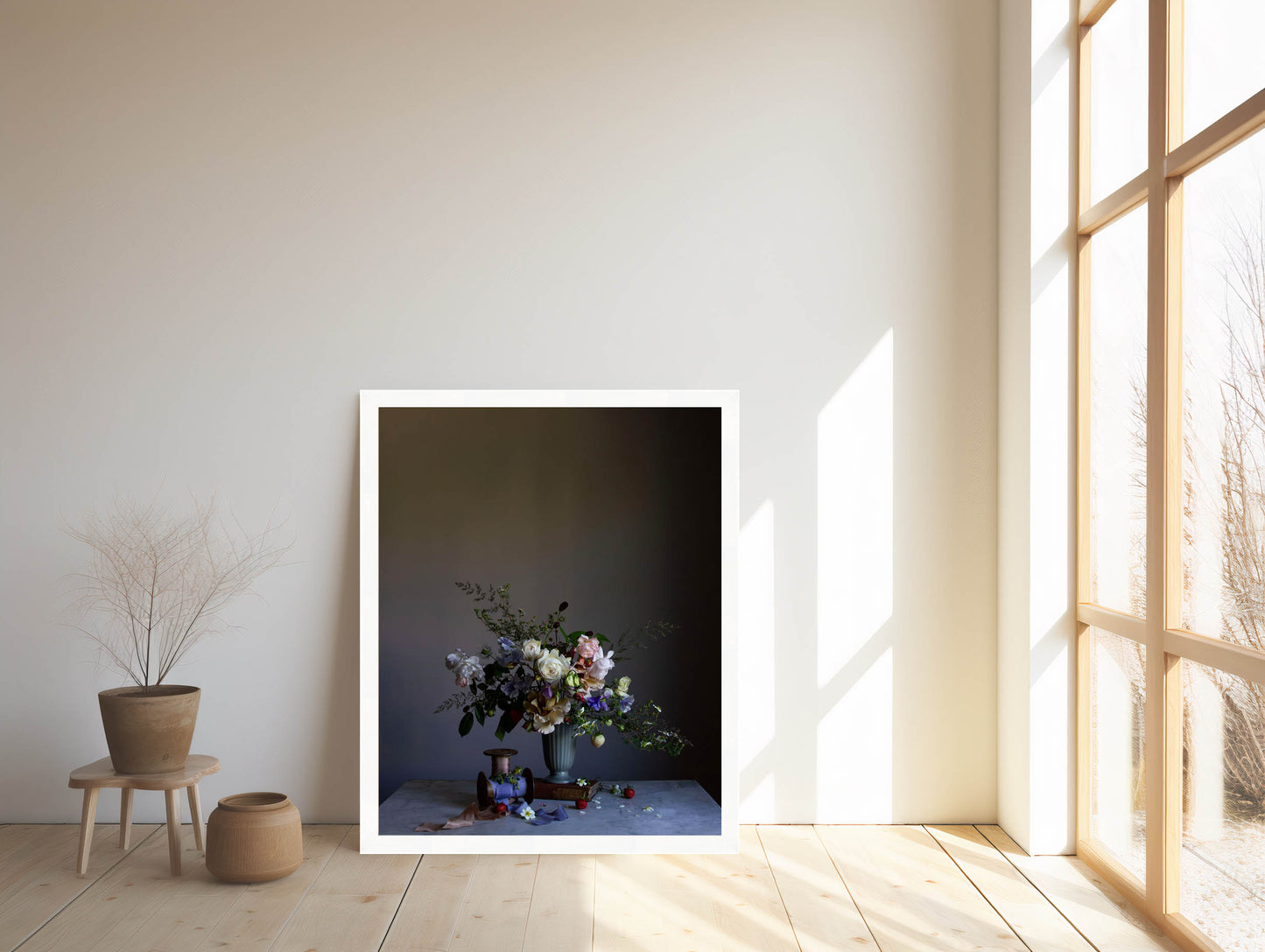 Framed artwork of a still life scene with flowers on a table in a room with large windows. Flower artwork