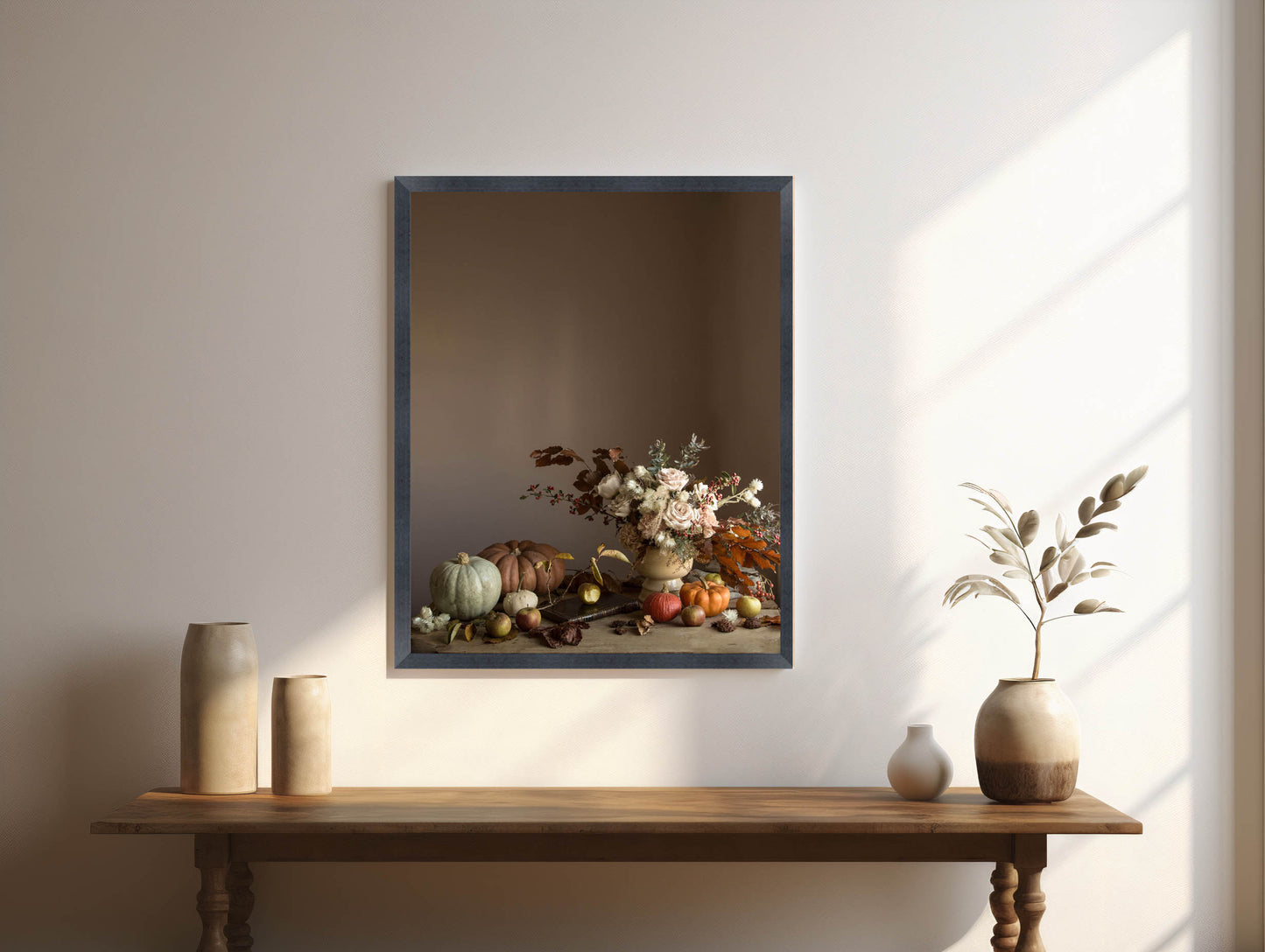 Framed artwork of a still life scene with flowers and fruits on a wooden table.