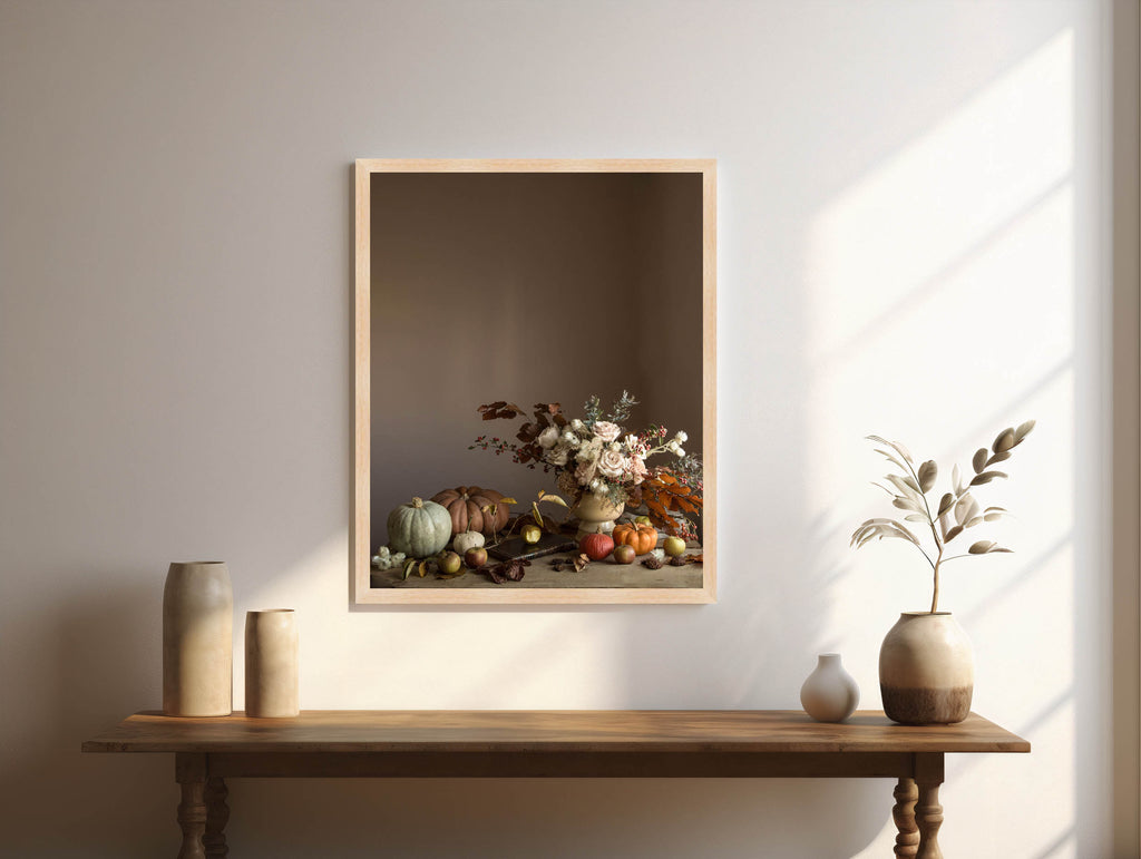 Framed still life art with flowers and fruits on a wooden table.