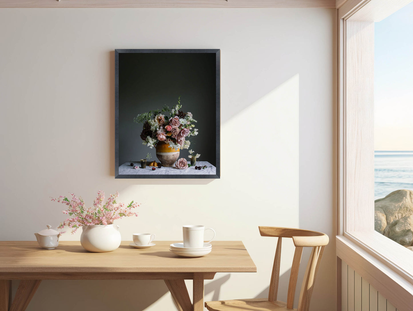 Dining room with a table, chairs, and a framed floral print on the wall.   Botanical picture