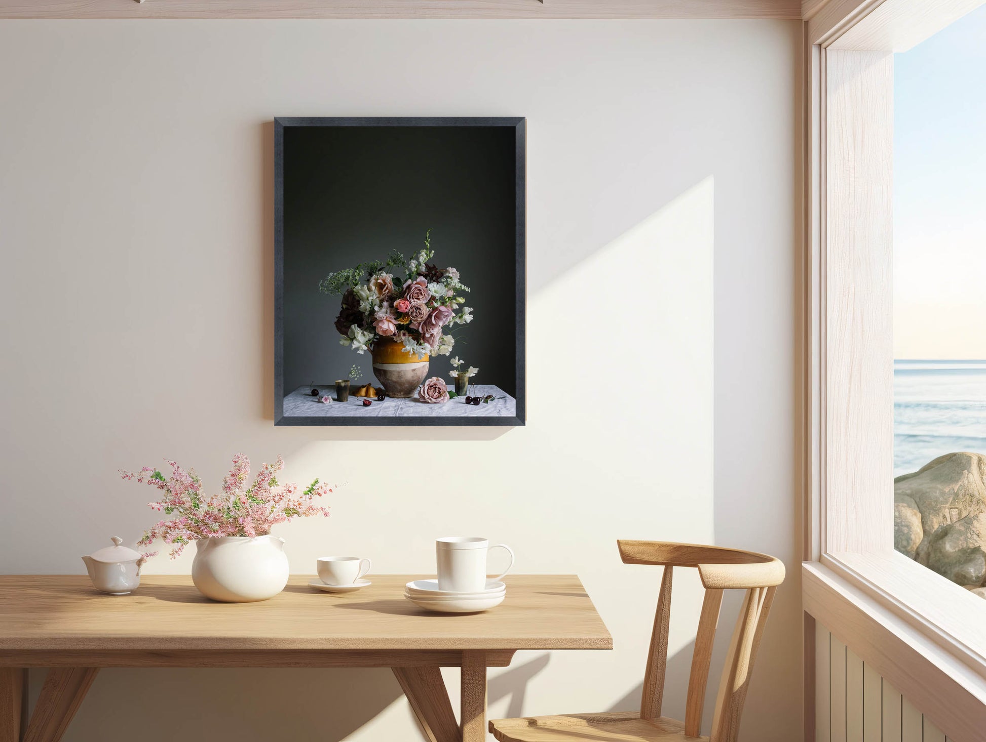 Dining room with a table, chairs, and a framed floral print on the wall.   Botanical picture