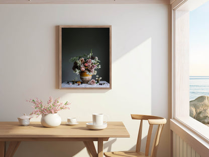 Dining room with a wooden table, chairs, and a framed picture of flowers on the wall.  floral picture
