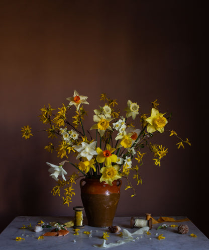 Floral still life art of daffodils in a vintage vase by Emma Harris