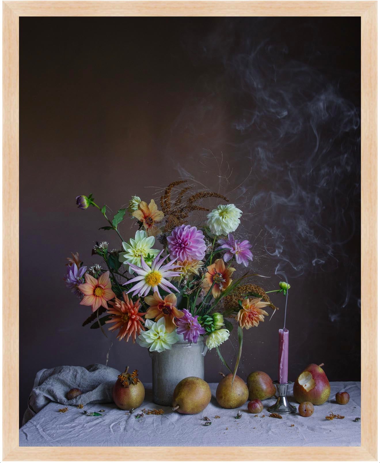 Still life arrangement with flowers and fruits on a dark background in an oak frame