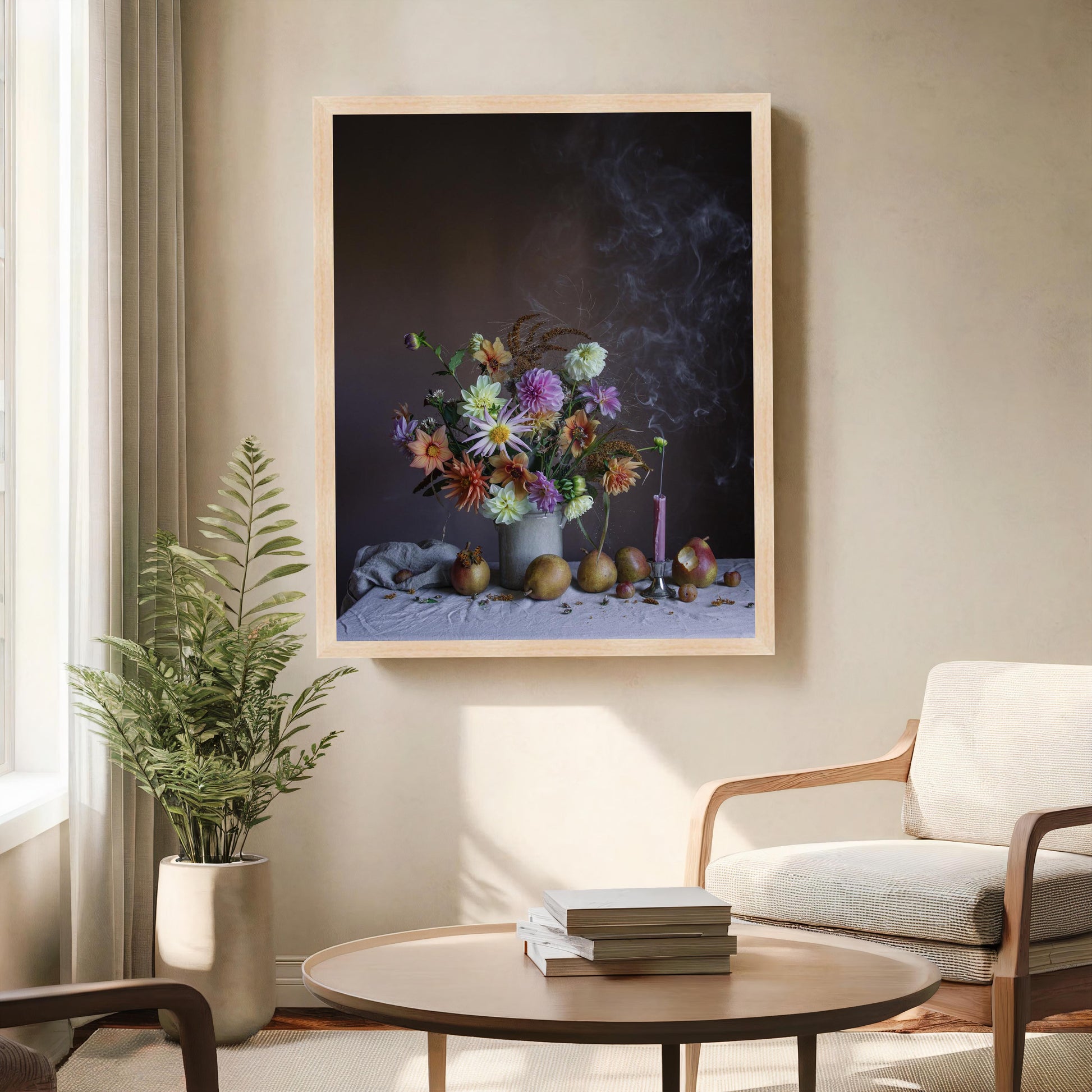 Framed artwork of a floral still life in a living room setting with a plant and coffee table.
