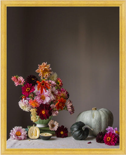 Still life with flowers and pumpkins on a dark background.   Flower art.