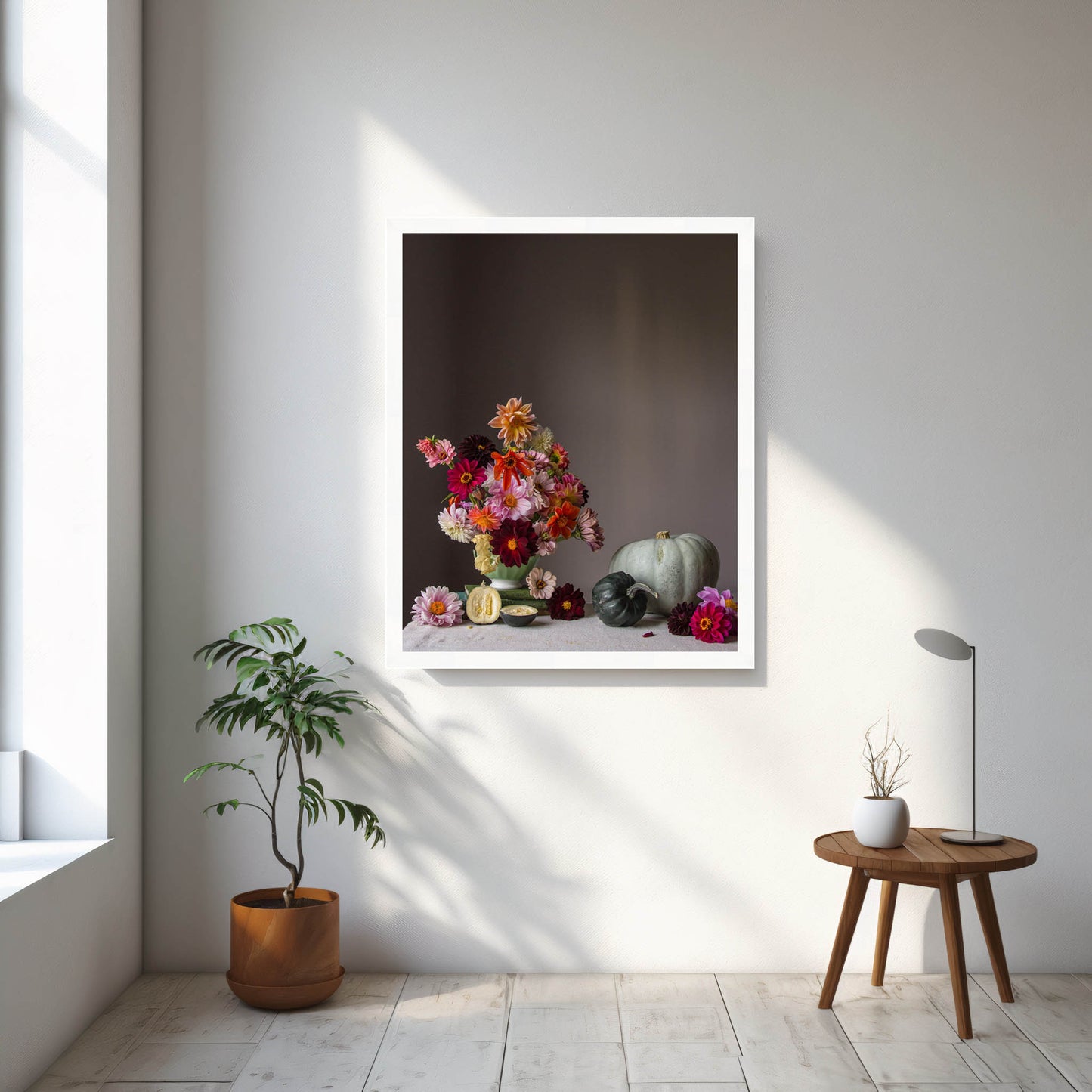 Framed still life artwork with flowers and vegetables on a wall in a bright room.   Botanical print.