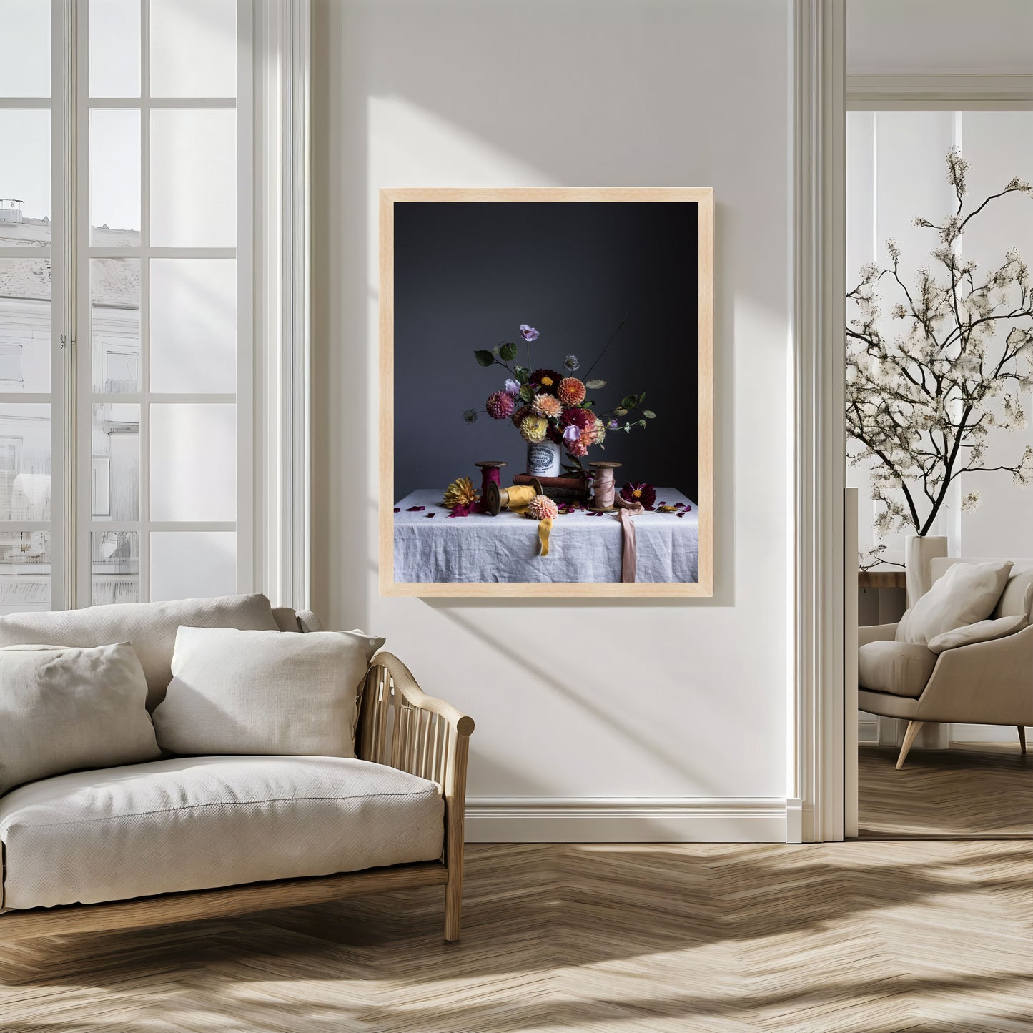 Framed artwork of a still life scene with flowers on a table in a modern living room.   Botanical print