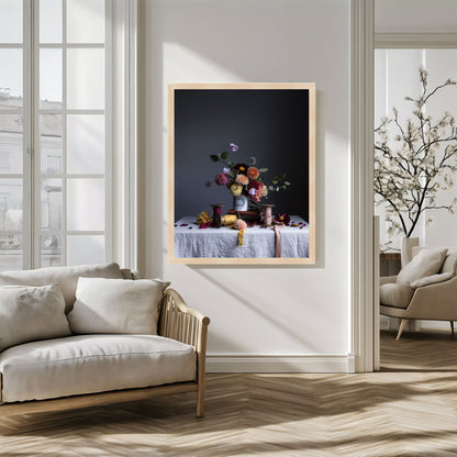 Framed artwork of a still life scene with flowers on a table in a modern living room.   Botanical print