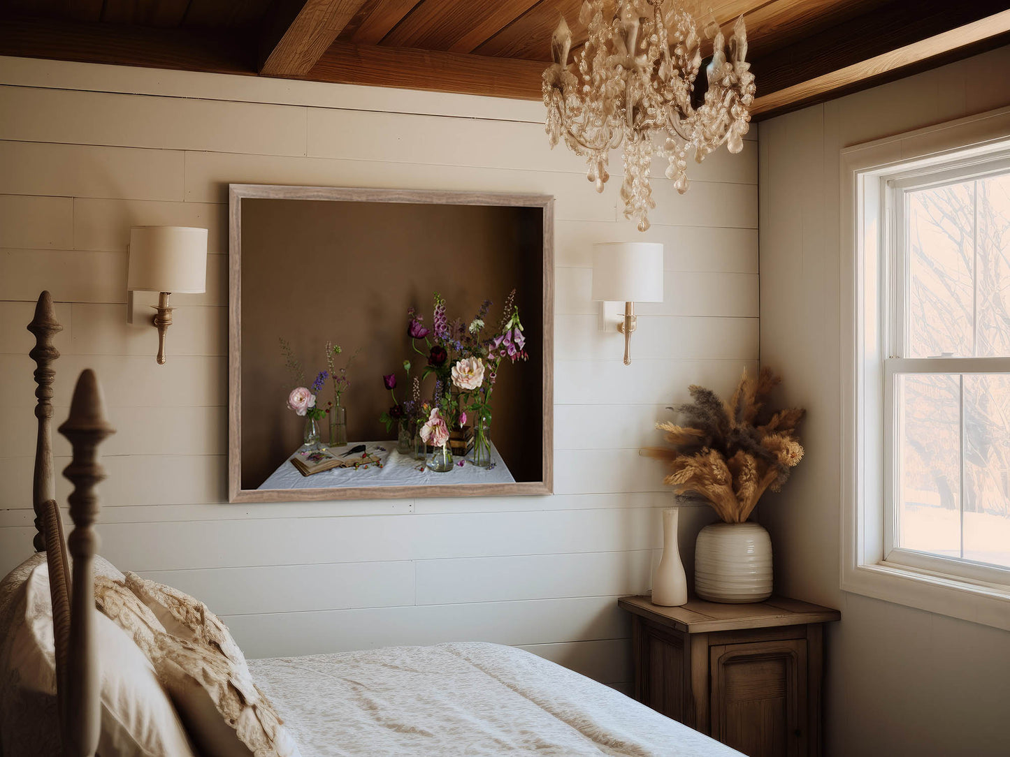 Bedroom with wooden bed, framed still-life floral print, and decorative elements.