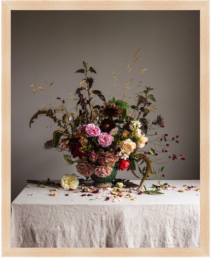 Floral arrangement on a table with a neutral background.   flower artwork