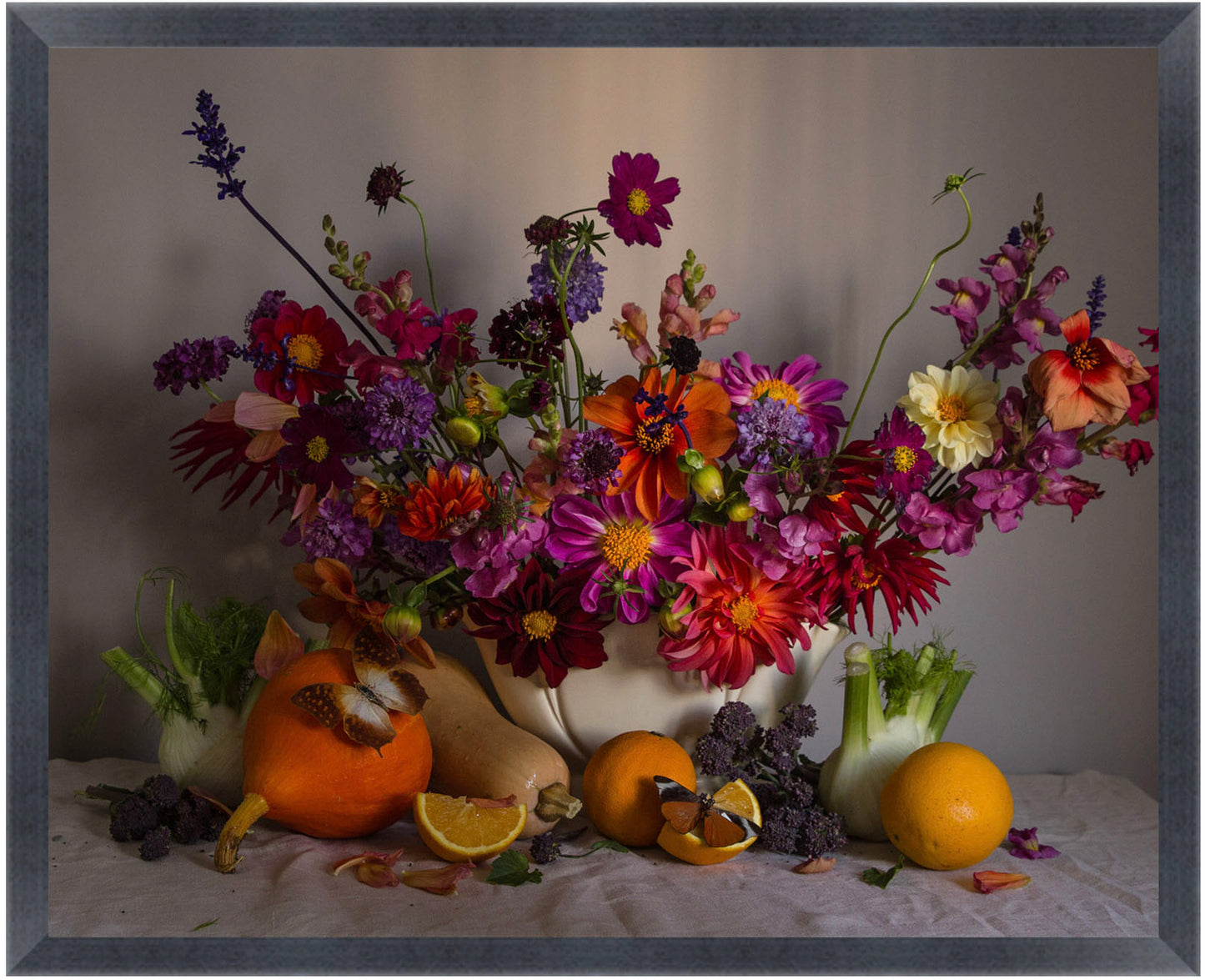 Framed Colourful floral arrangement with fruits and vegetables on a neutral background