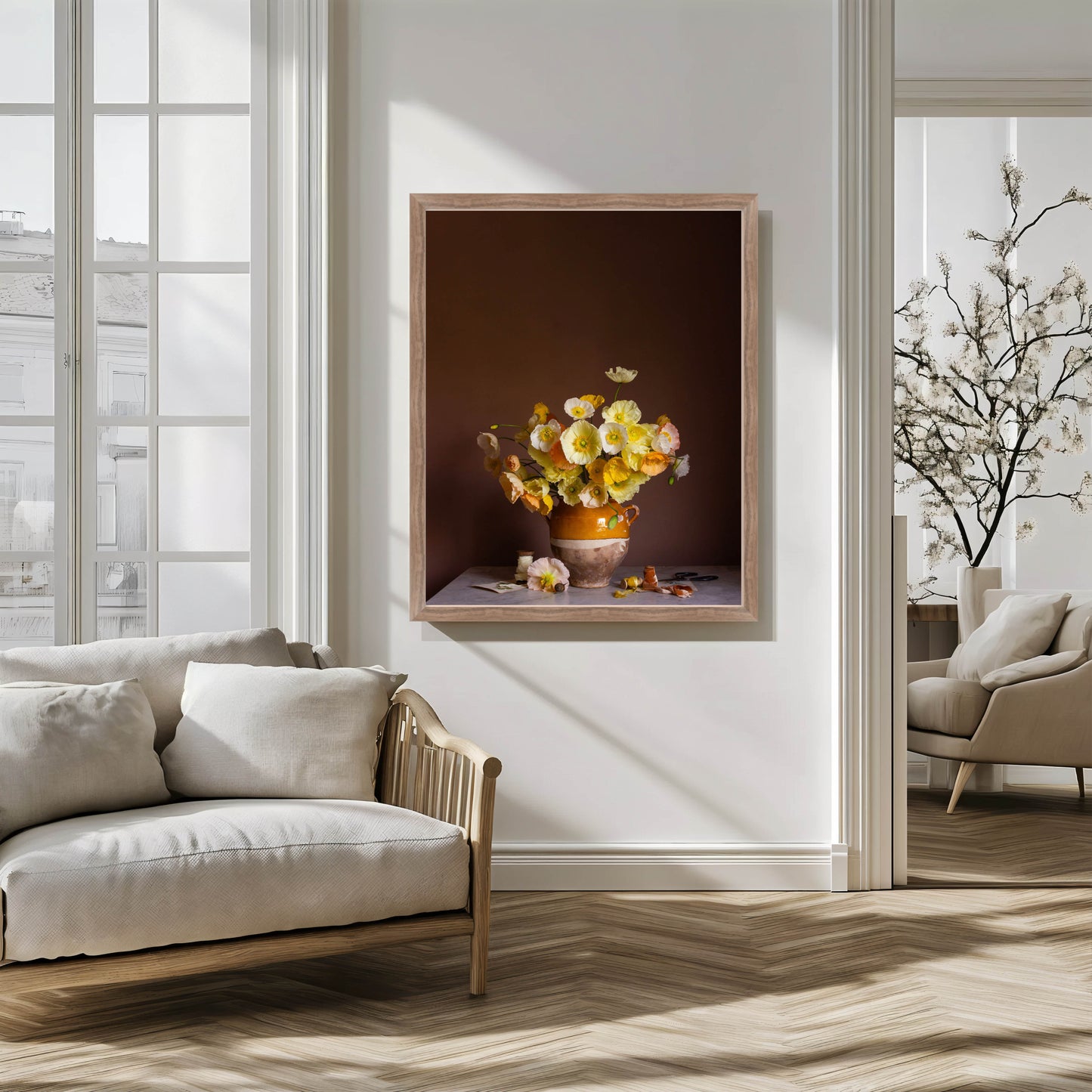 Framed artwork of a floral still life in a modern living room.