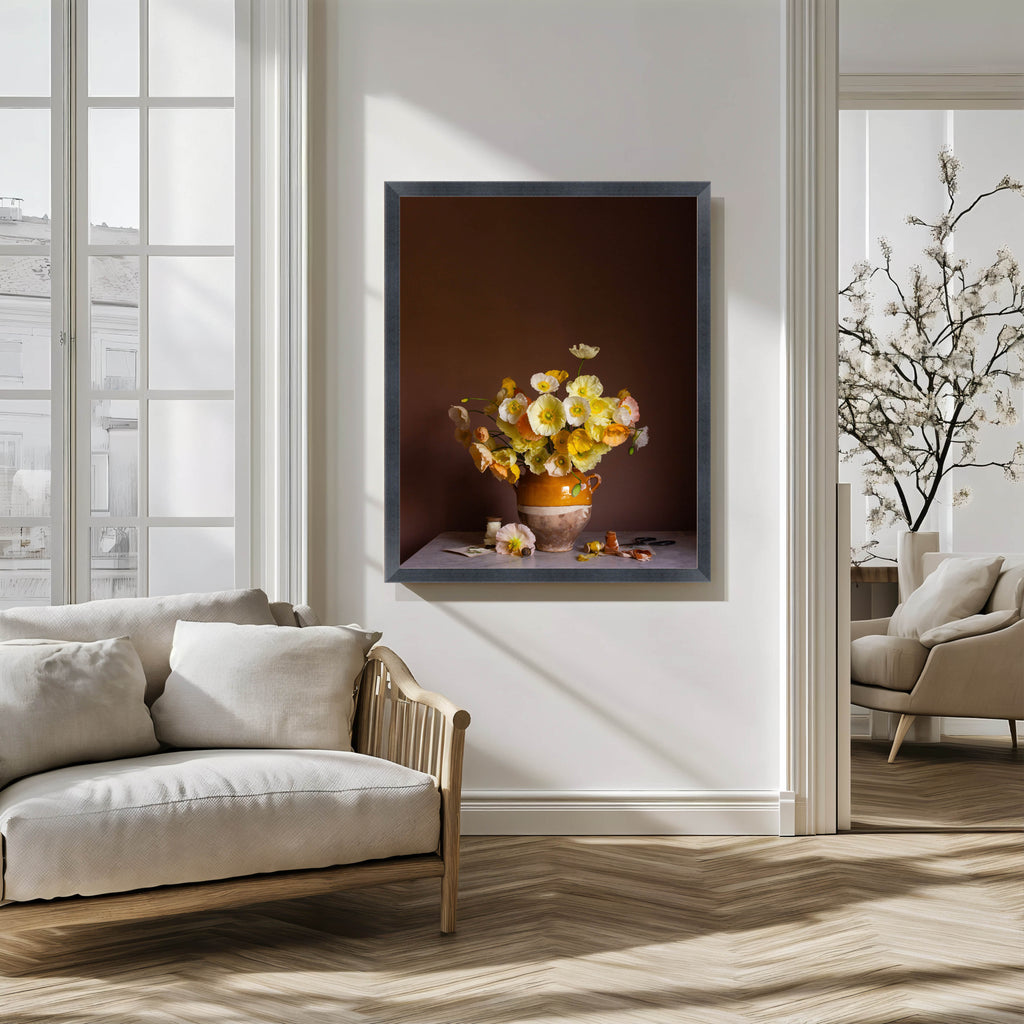 Framed artwork of a floral still life in a modern living room.