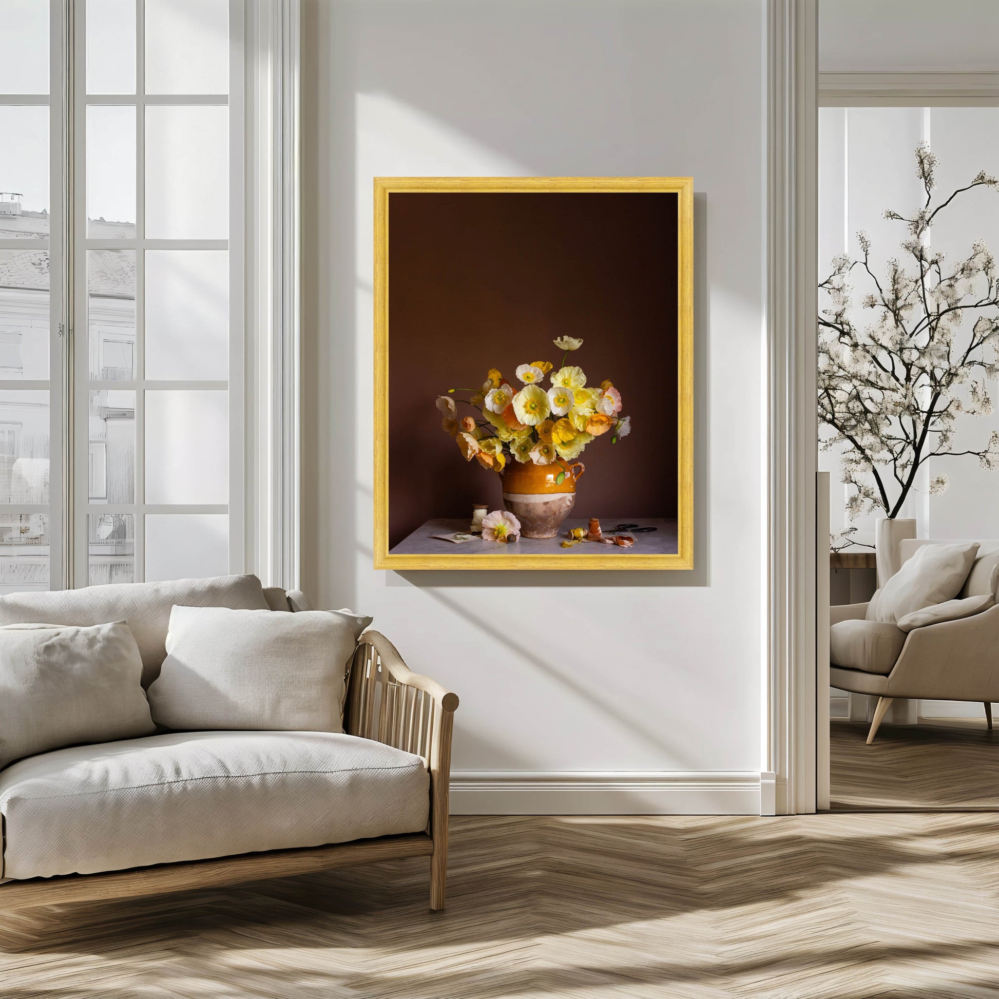 Framed artwork of a floral still life on a wall in a modern living room.