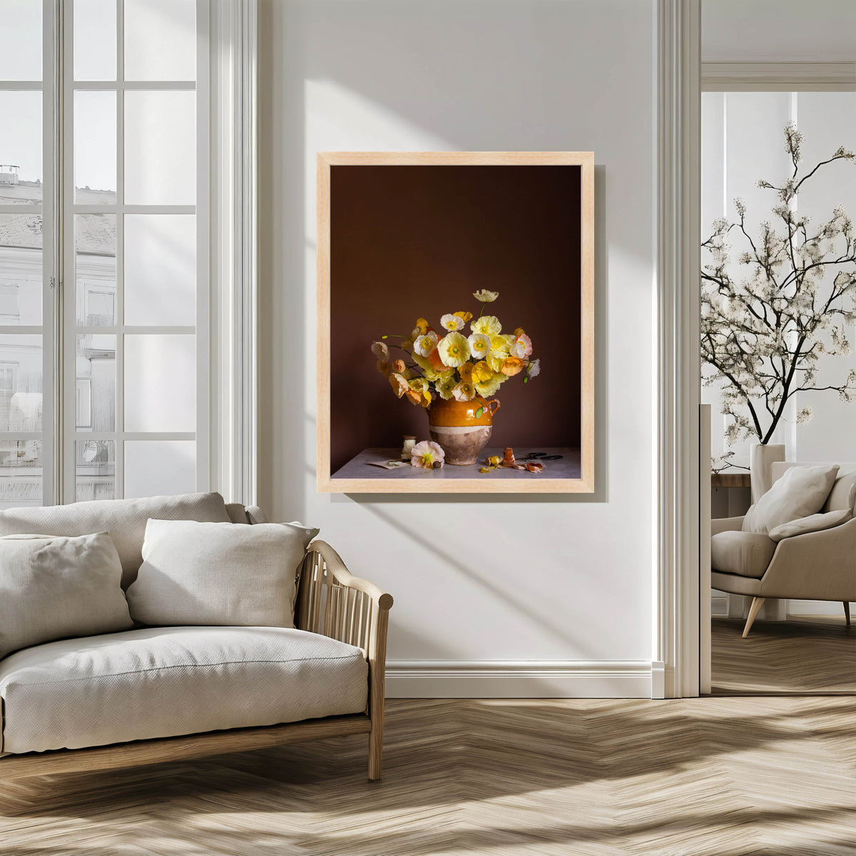Framed artwork of a still life with flowers in a modern living room.