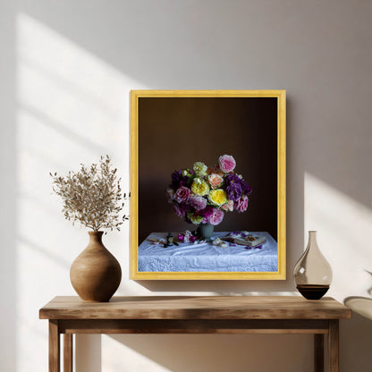 Framed artwork of a floral arrangement on a wooden table with decorative vases.