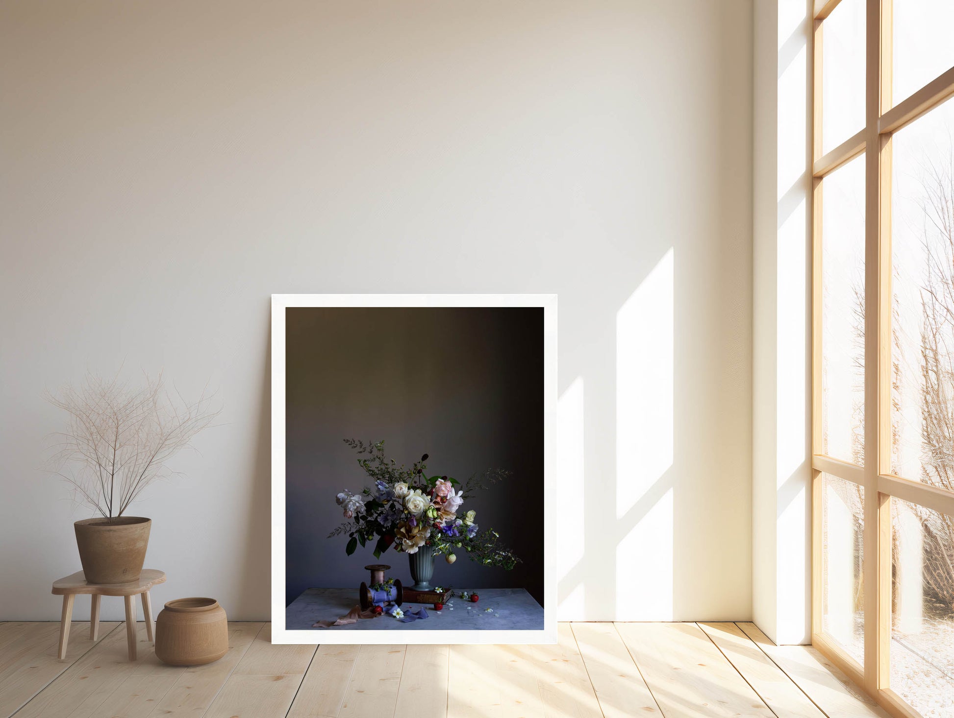 Framed artwork of a still life scene with flowers on a table in a room with large windows.   Flower artwork