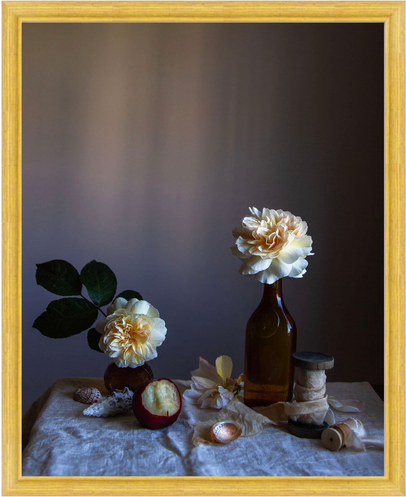 Framed Still life arrangement with roses in bottles on a textured surface, framed in gold. Botanical art