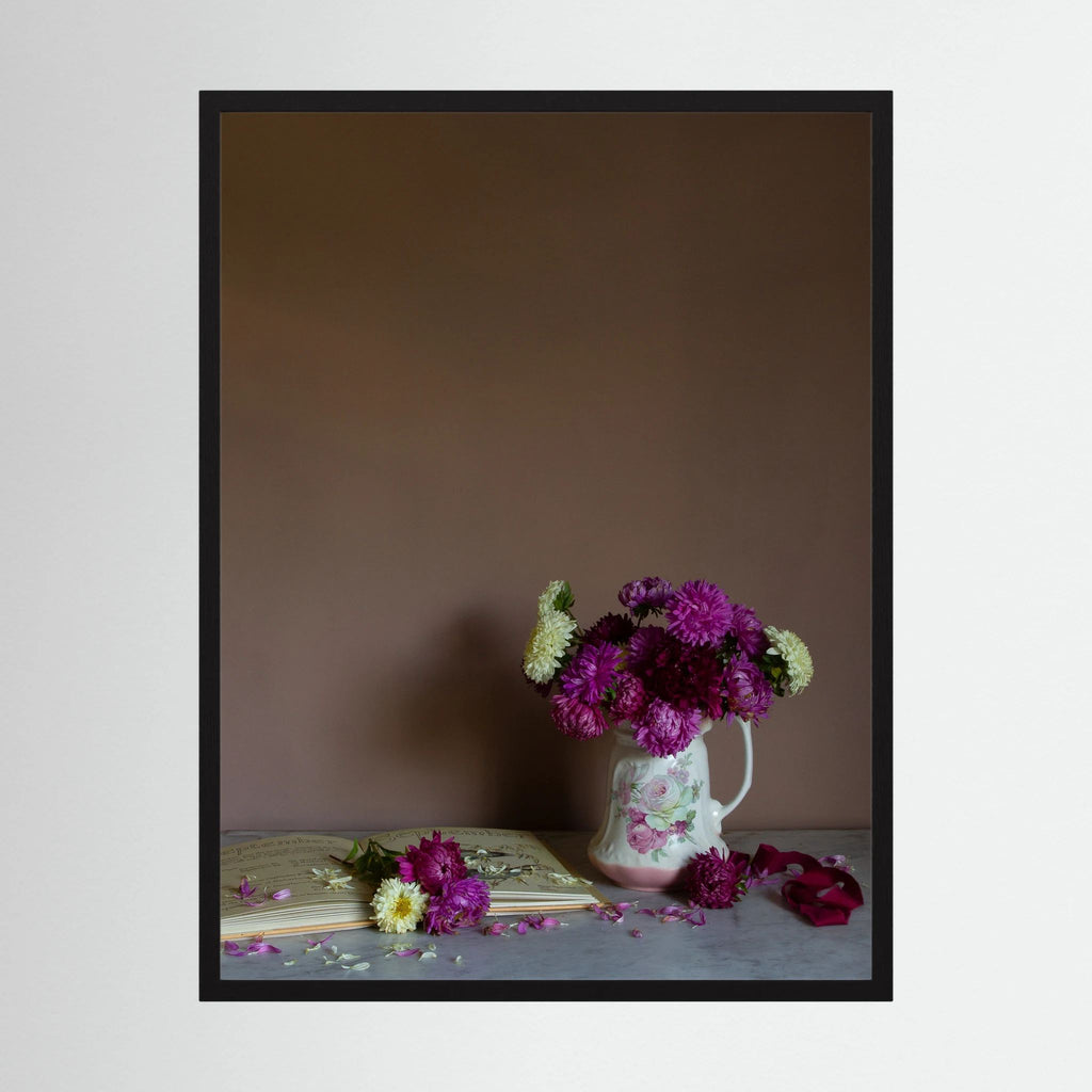 A floral art print of September birth month flowers, asters in a black frame by photographer Emma Harris